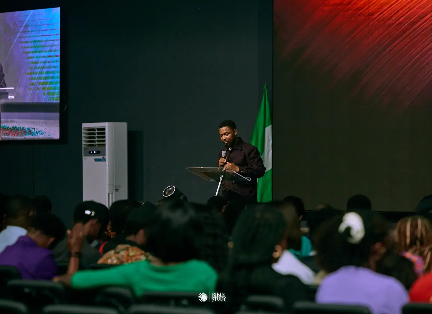 Jacob Odunlami speaking to an audience